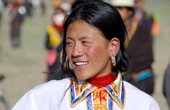 China Osttibet, Pferde-Trekking um den Amnye Machen. Junger Tibeter beim Reiterfestival. Foto: Günther Härter. 